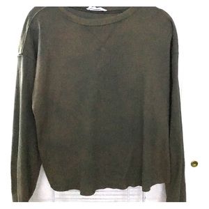 Long sleeve, loose crop top.